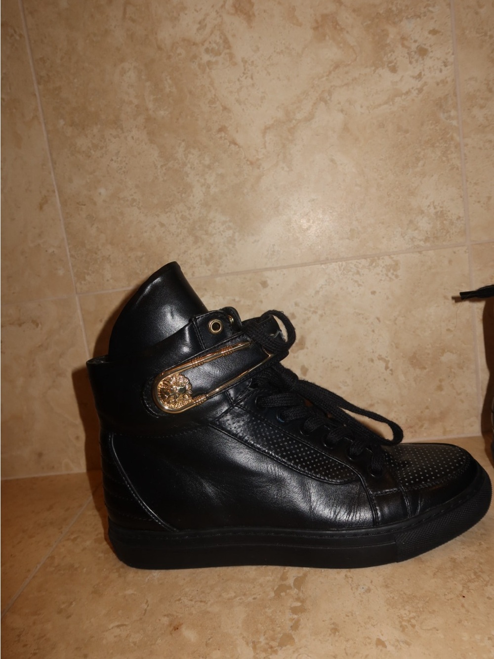 Versace versus high-top sneakers